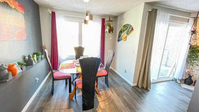 316 Coachway Lane Sw, Home with 3 bedrooms, 2 bathrooms and 2 parking in Calgary AB | Image 7