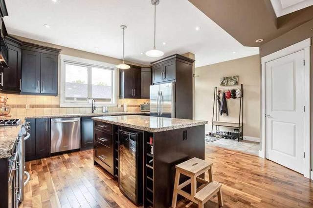 1129 Renfrew Drive Ne, Home with 4 bedrooms, 3 bathrooms and 2 parking in Calgary AB | Image 12