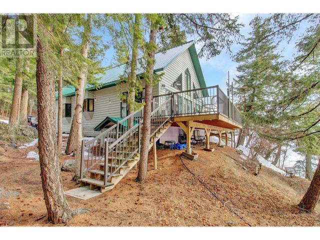 3813 Stones Bay Road, House detached with 2 bedrooms, 3 bathrooms and null parking in Bulkley Nechako C BC | Image 1