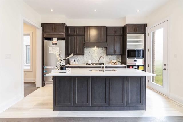 2427 Saw Whet Blvd, House detached with 4 bedrooms, 6 bathrooms and 6 parking in Oakville ON | Image 33