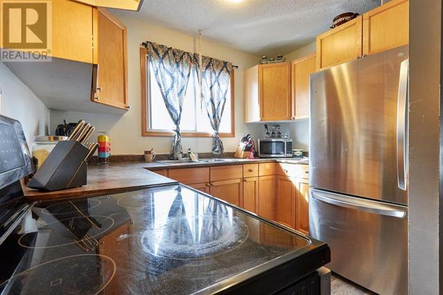 1683 4 Avenue Ne, Home with 3 bedrooms, 2 bathrooms and 1 parking in Medicine Hat AB | Image 9