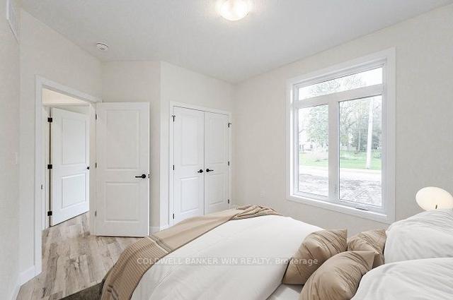 407 Jane St, House detached with 3 bedrooms, 2 bathrooms and 6 parking in Minto ON | Image 8