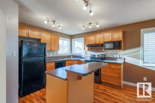 12055 19 Av Sw, House detached with 4 bedrooms, 2 bathrooms and 2 parking in Edmonton AB | Image 36