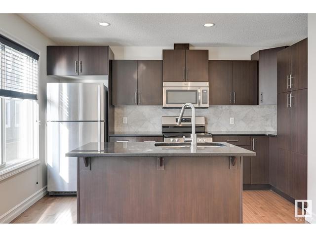 87 - 3625 144 Av Nw, House attached with 3 bedrooms, 2 bathrooms and null parking in Edmonton AB | Image 16
