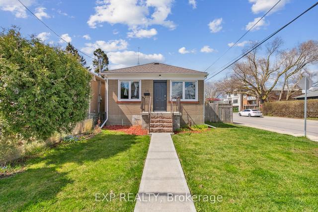 36 Twenty Fourth St, House detached with 3 bedrooms, 2 bathrooms and 2 parking in Toronto ON | Image 1