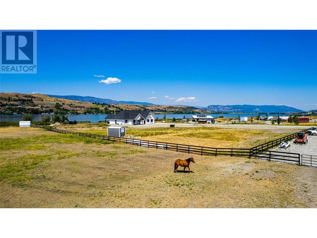 7080 Heron Road, House detached with 5 bedrooms, 2 bathrooms and 36 parking in North Okanagan B BC | Image 7