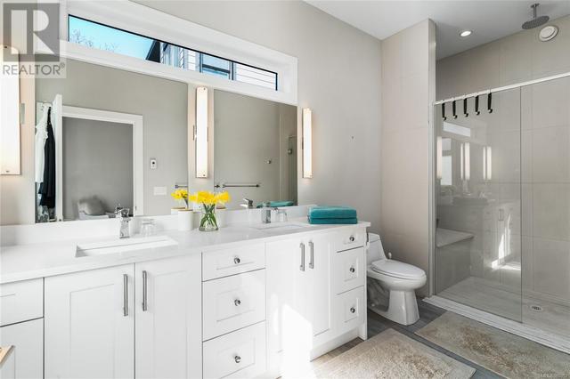 Primary ensuite with double sinks, heated floors and large shower | Image 23