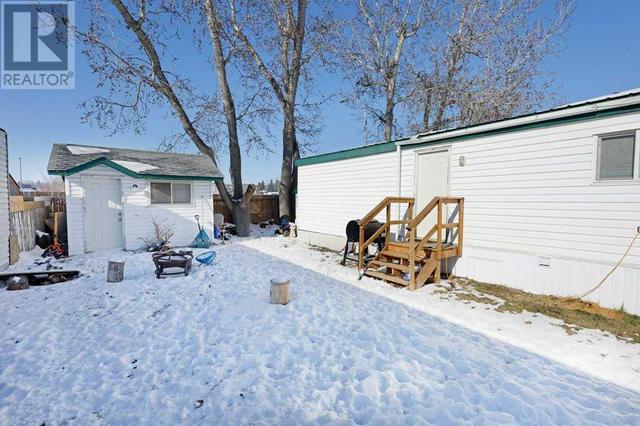 20 Greenbrook Village, Home with 2 bedrooms, 1 bathrooms and 2 parking in Brooks AB | Image 21