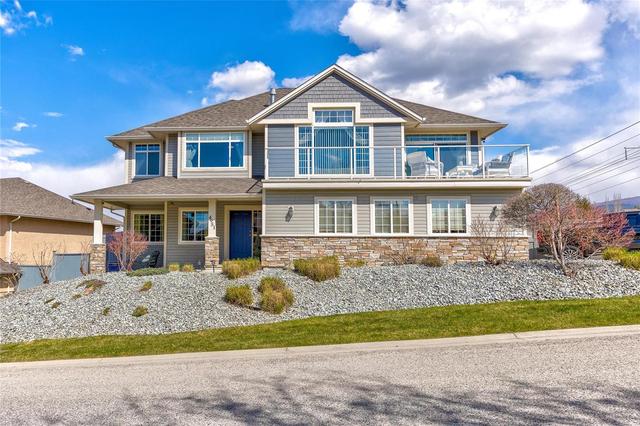 4951 Windsong Crescent, House detached with 5 bedrooms, 3 bathrooms and 6 parking in Kelowna BC | Card Image