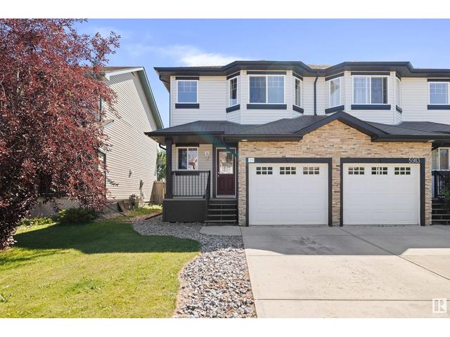 5911 8 Av Sw, House semidetached with 2 bedrooms, 2 bathrooms and null parking in Edmonton AB | Card Image