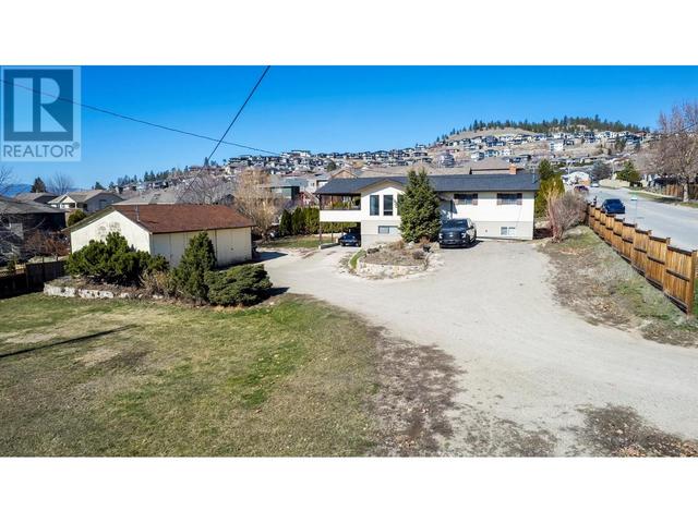 1584 Highway 33 E, House detached with 4 bedrooms, 2 bathrooms and 20 parking in Kelowna BC | Image 1