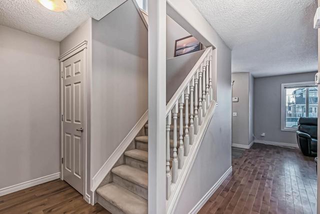 81 Crystal Shores Crescent, House detached with 4 bedrooms, 2 bathrooms and 2 parking in Calgary AB | Image 9