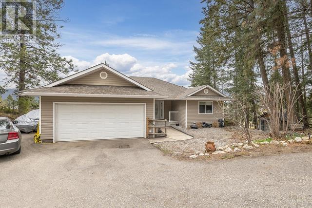 10291 Columbia Way, House detached with 3 bedrooms, 3 bathrooms and 7 parking in Central Okanagan West BC | Image 2