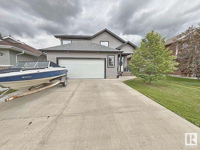 9406 83 Av, House detached with 4 bedrooms, 3 bathrooms and 4 parking in Morinville AB | Image 1