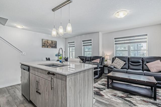 268 Carrington Way Nw, Home with 3 bedrooms, 2 bathrooms and 2 parking in Calgary AB | Image 3