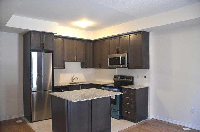 122 - 32 Fieldway Rd, Townhouse with 1 bedrooms, 1 bathrooms and 1 parking in Toronto ON | Image 1
