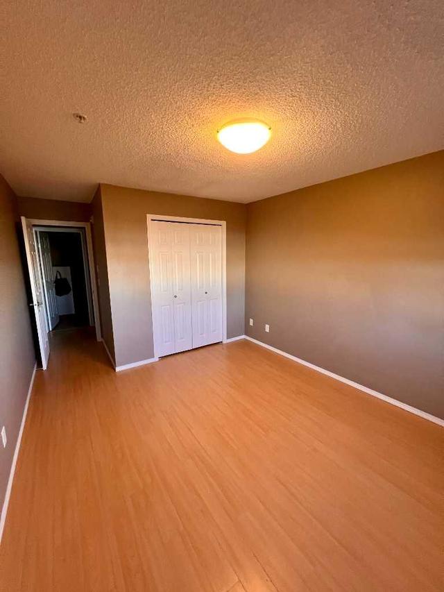 2105 - 700 Willowbrook Road Nw, Condo with 2 bedrooms, 2 bathrooms and 1 parking in Airdrie AB | Image 27
