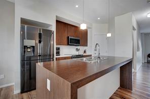 91 - 300 Evanscreek Court Nw, Home with 2 bedrooms, 2 bathrooms and 1 parking in Calgary AB | Image 4