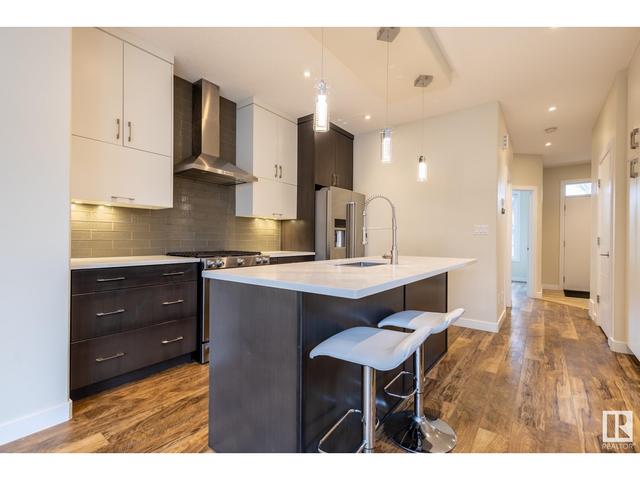 7551 80 Av Nw, House semidetached with 4 bedrooms, 4 bathrooms and null parking in Edmonton AB | Image 19