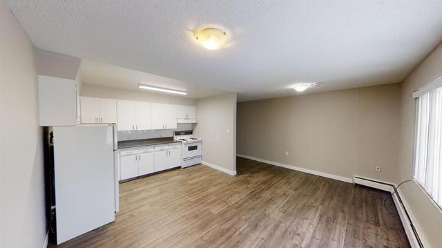 202 - 9926 105 Avenue, Home with 0 bedrooms, 1 bathrooms and null parking in Greenview No. 16 AB | Image 3