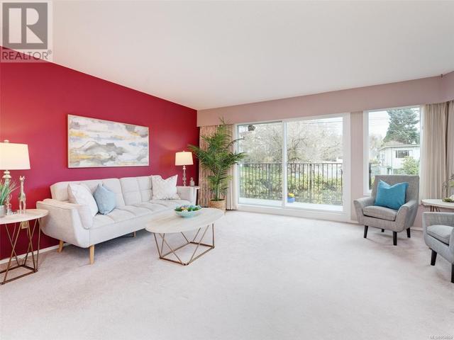 Living room - Easy access to balcony (faces Linden Ave) with beautiful garden views. | Image 3