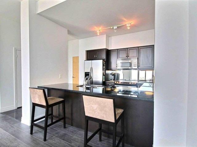412 - 58 Marine Parade Dr, Condo with 2 bedrooms, 2 bathrooms and 2 parking in Toronto ON | Image 3