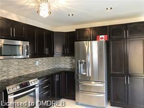 1001 Farmstead Dr, House detached with 4 bedrooms, 3 bathrooms and 4 parking in Milton ON | Image 3