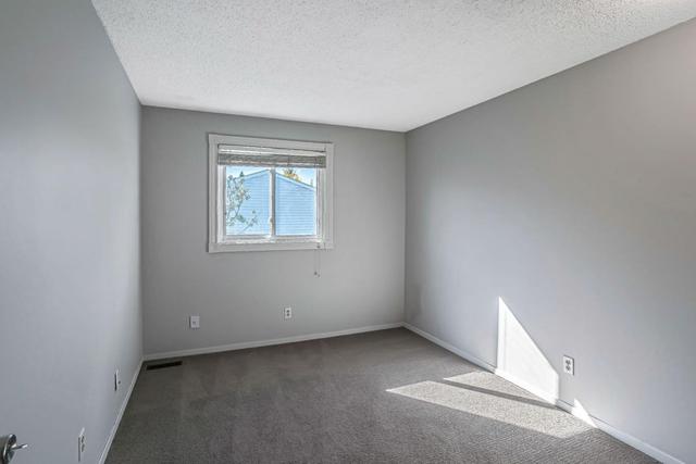 502 - 340 Falconridge Crescent Ne, Home with 3 bedrooms, 1 bathrooms and 1 parking in Calgary AB | Image 8