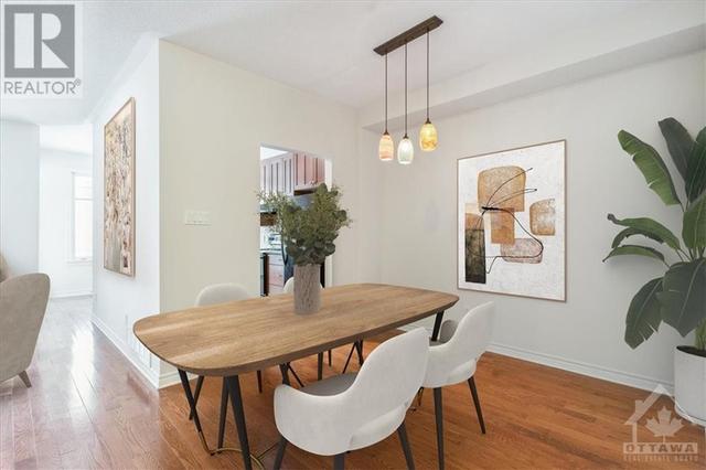 Virtually staged dining room. | Image 8