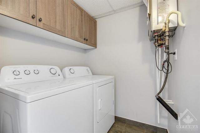 Top floor laundry room, large enough for some storage | Image 22