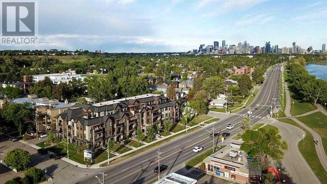 205, - 3320 3 Avenue Nw, Condo with 2 bedrooms, 2 bathrooms and 41 parking in Calgary AB | Image 2