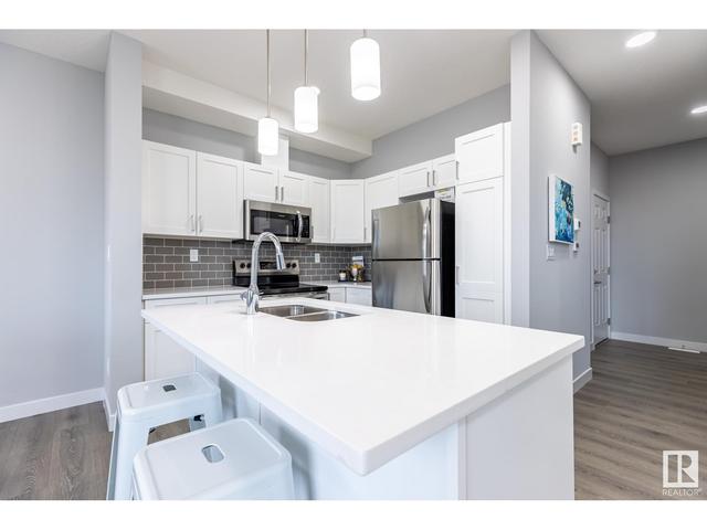 2 - 740 Daniels Wy Sw, House attached with 3 bedrooms, 2 bathrooms and 1 parking in Edmonton AB | Image 2