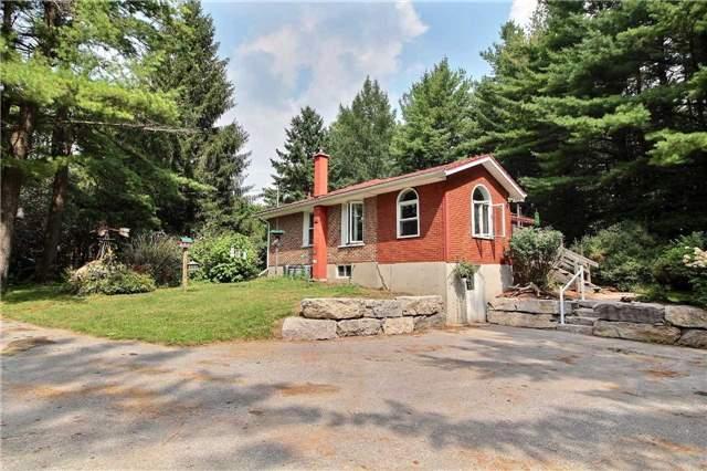 1004 Telecom Rd, Home with 2 bedrooms, 2 bathrooms and 20 parking in Kawartha Lakes ON | Image 1
