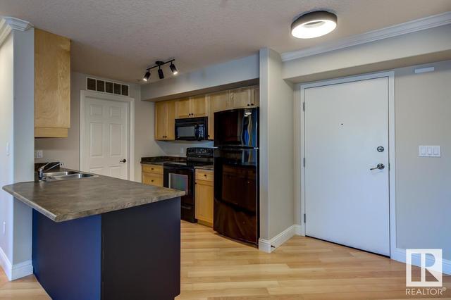 213 - 13111 140 Av Nw, Condo with 2 bedrooms, 2 bathrooms and 2 parking in Edmonton AB | Image 8