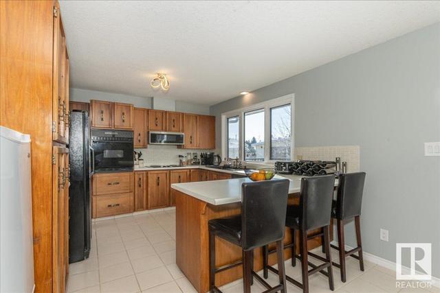 8433 14 Av Nw, House detached with 4 bedrooms, 3 bathrooms and 4 parking in Edmonton AB | Image 10