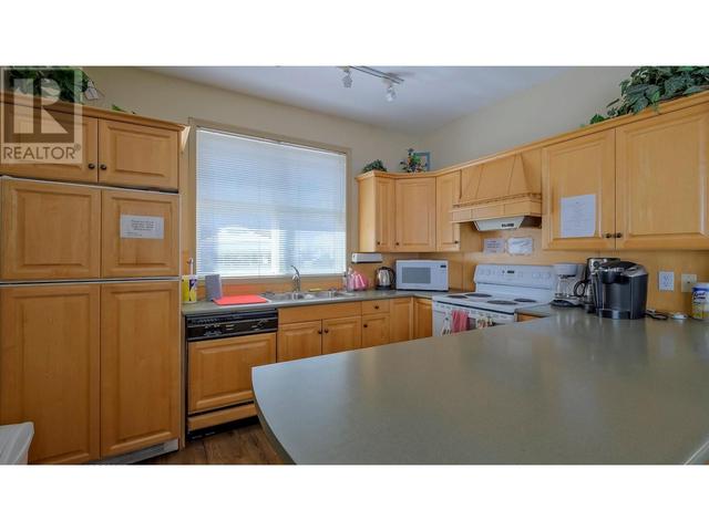 210 - 515 Houghton Road, Condo with 2 bedrooms, 2 bathrooms and null parking in Kelowna BC | Image 39