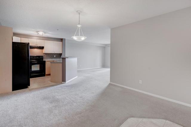 7204 - 304 Mackenzie Way Sw, Condo with 2 bedrooms, 1 bathrooms and 1 parking in Calgary AB | Image 11