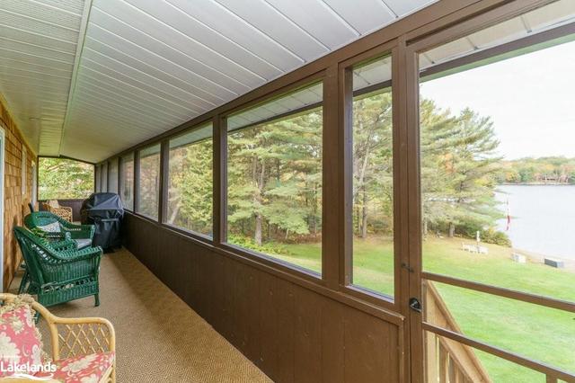 Screened Muskoka Room runs the entire length of the cottage | Image 31
