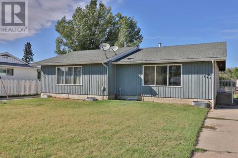 143, - 145 7a Avenue W, Home with 10 bedrooms, 4 bathrooms and 4 parking in Cardston AB | Card Image