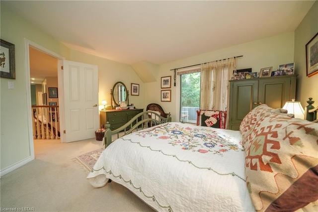 Primary bedroom with ample storage and plenty of large windows | Image 33