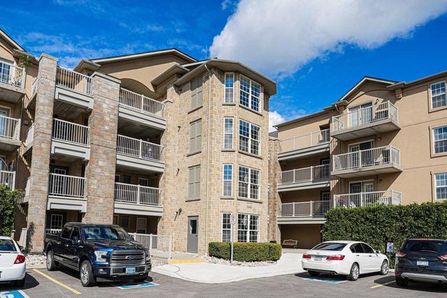 307 - 1440 Bishops Gate, Condo with 2 bedrooms, 1 bathrooms and 1 parking in Oakville ON | Card Image