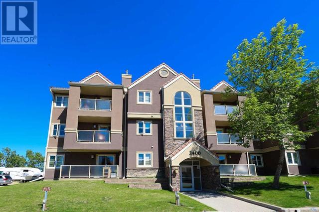 2422, - 3400 Edenwold Heights Nw, Condo with 2 bedrooms, 2 bathrooms and 1 parking in Calgary AB | Image 3