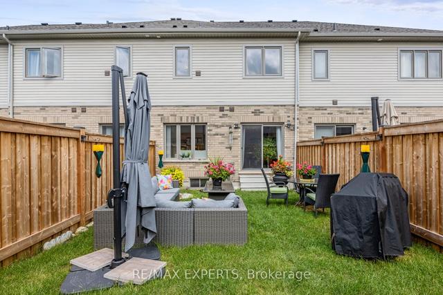 29 Arnold Cres, House attached with 3 bedrooms, 3 bathrooms and 4 parking in New Tecumseth ON | Image 25