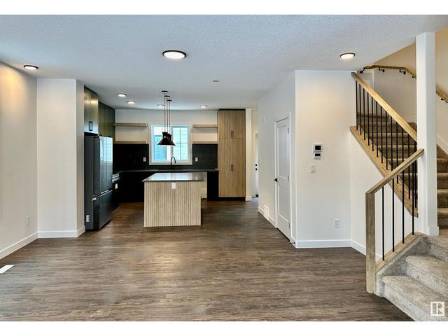 7744 Yorke Me Nw Nw, House attached with 4 bedrooms, 3 bathrooms and 4 parking in Edmonton AB | Image 5