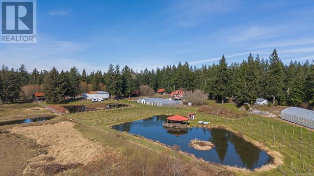 243 Cape Mudge Rd, House detached with 6 bedrooms, 4 bathrooms and 100 parking in Strathcona C BC | Image 54