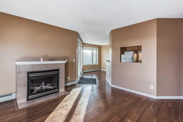 1314 - 950 Arbour Lake Road Nw, Condo with 2 bedrooms, 2 bathrooms and 1 parking in Calgary AB | Image 6