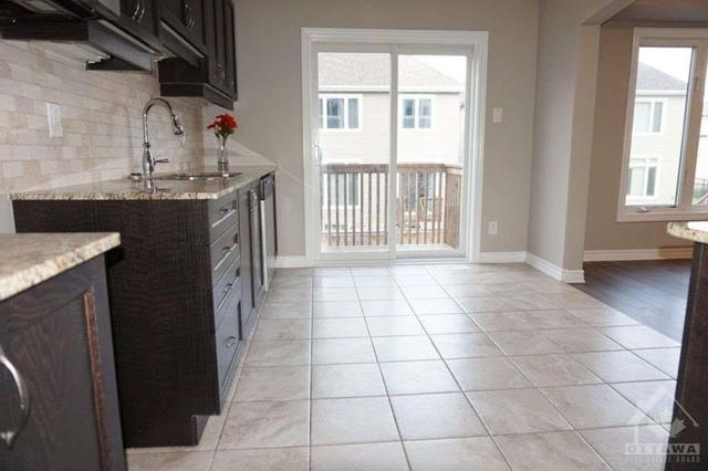 322 Astelia Crescent, Townhouse with 3 bedrooms, 3 bathrooms and 1 parking in Ottawa ON | Image 4