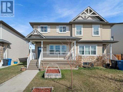 1538 Mcalpine Street, House semidetached with 3 bedrooms, 2 bathrooms and 3 parking in Carstairs AB | Card Image