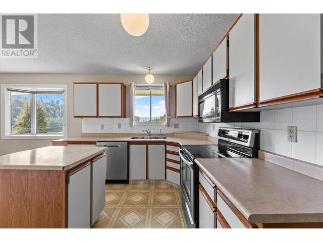 1276 Rio Drive, House detached with 4 bedrooms, 2 bathrooms and 6 parking in Kelowna BC | Image 13