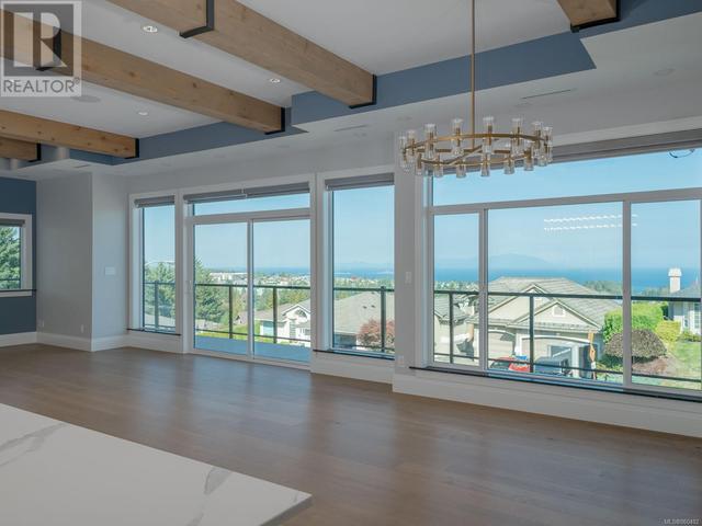 Dining area with ocean and mountain views | Image 34